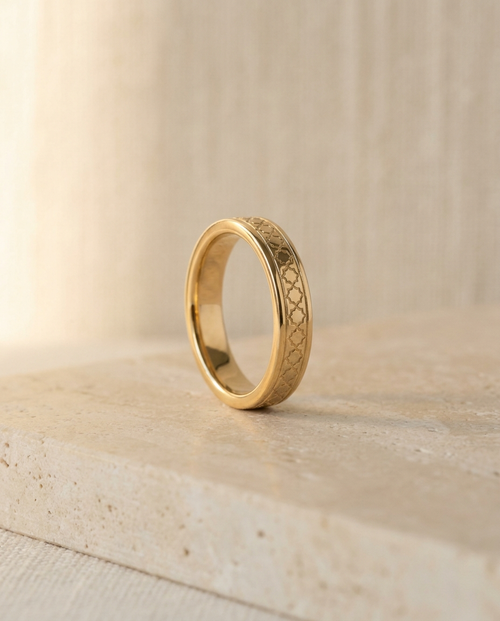 Girih Band — 18k gold ring with engraved girih lattice pattern on cream stone